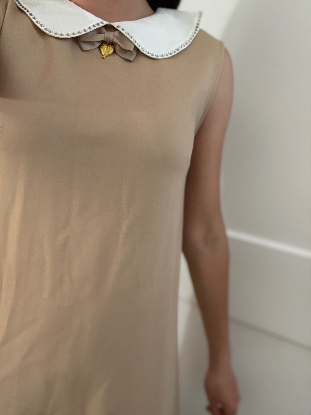 Angel’s Face tan crystal collar shift dress